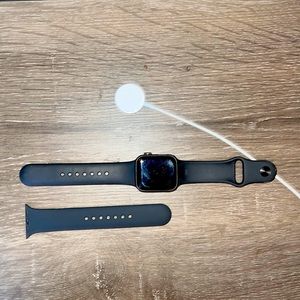 Apple Watch SE GPS, 40mm Space Gray Aluminum Case with Black Sport Band - M/L